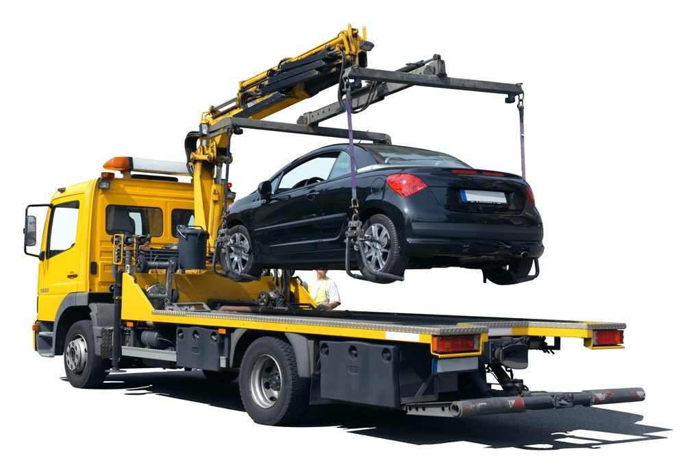 Car towing by a tow truck