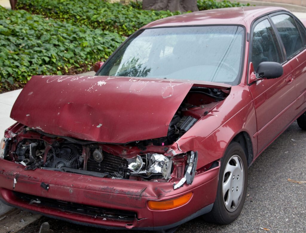 wrecked car parked in brisbane road